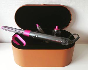 Dyson Airwrap and attachments in leather case