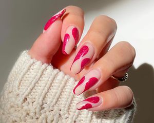 Neutral elongated manicure with abstract hot pink nail design