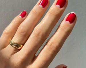Close up of a manicured hand with clean, healthy cuticles