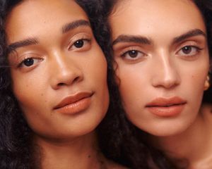 Two women with glowing skin and minimal, radiant makeup