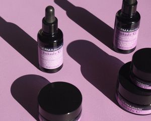 purple bottles on purple background