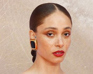 Close up of the model Adwoa Aboah, and her heart ear tattoo
