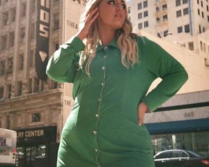 Model wearing long-sleeved green mini dress