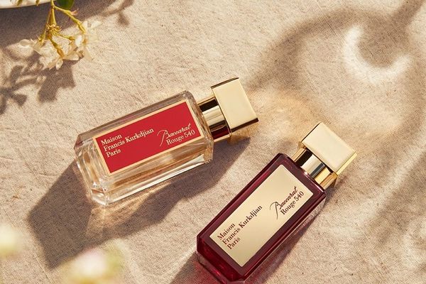 Most popular perfume on TikTok next to flowers