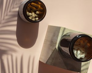 Probiotic supplement jars viewed from above.