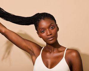 woman with braided ponytail 