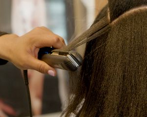 Woman getting a silk press