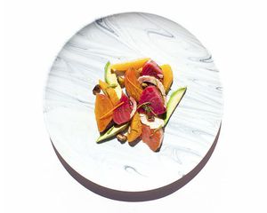healthy lunch plate with sweet potato, beet, avocado, and onions