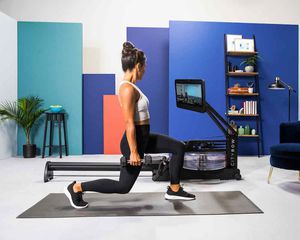 woman using cityrow go machine