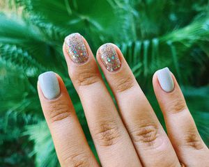 Close-Up Of Woman Hand Showing Nail Art