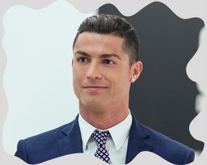 Close up of soccer star Cristiano Ronaldo with a comb over haircut.