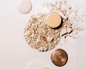 Crushed powder and pools of liquid foundation and bronzer.