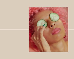 Frozen cucumber on a woman's face 