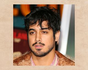 Avan Jogia wears a tousled fringe haircut