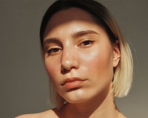 young woman with dewy skin