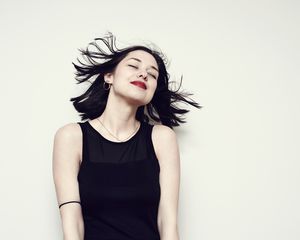 Woman in a black tank top