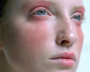 woman wearing pink blush