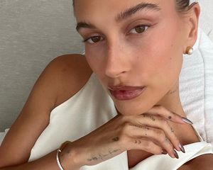 Hailey Bieber with a chocolate glazed donut manicure