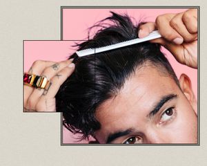 Close up of a man combing a full head of hair