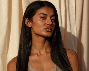 Photo of model with long dark hair