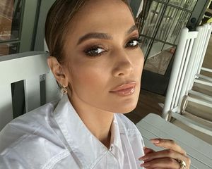 J. Lo with a slick bun hairstyle 