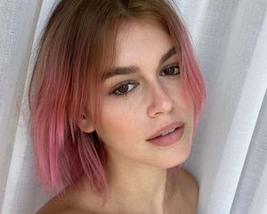 Kaia Gerber with pink hair and subtle eyeliner 