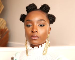 Kiki Layne wearing Bantu knots.