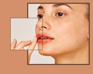 Woman touching her lip.