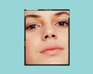 Up close of a young woman's face, with full lips