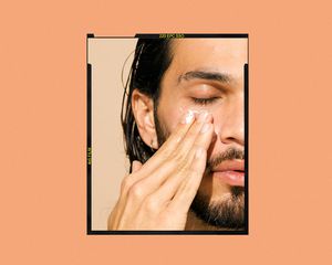 Man applying skincare products