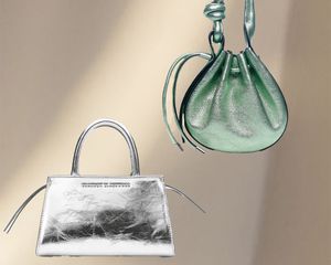 Metallic handbags by Brandon Blackwood and Behno on sunlit wall background