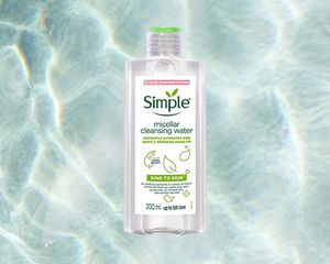 simple micellar cleansing water on water background