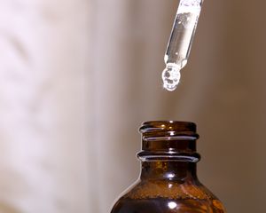 Minoxidil bottle and dropper