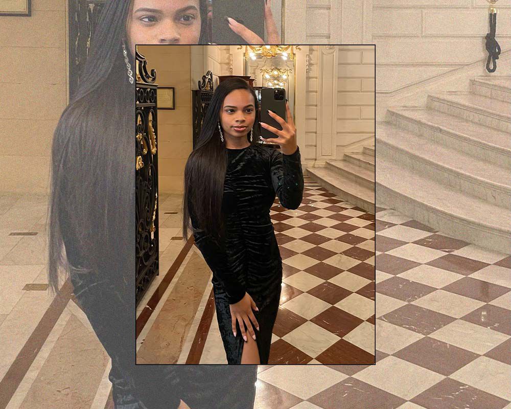 Olivia Hancock wearing a black velvet dress.