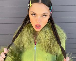 Olivia Rodrigo in a green jacket