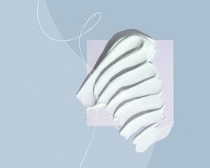 ouai body lotion texture on white background