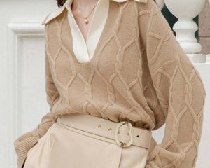 Model wearing an oversized sweater from Petite Studio