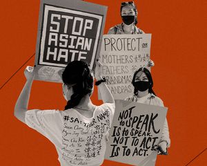 protestors holding stop asian hate signs