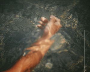 Hand in water