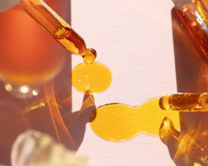 Yellow-orange liquid and droppers