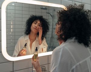 woman applying skincare