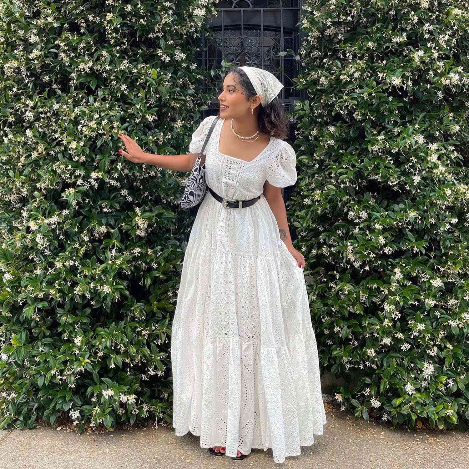 @islandgirlshaz wearing a bandana and island girl dress