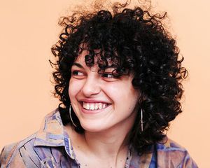woman with spiral perm
