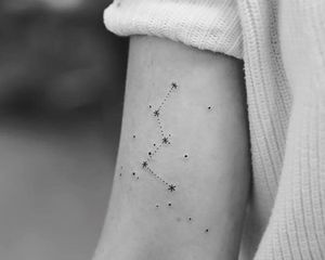woman with a star tattoo on her arm