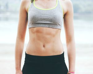 woman showing abs