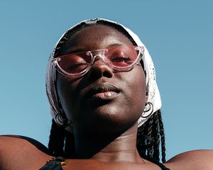 Close up of a woman bathing in sunlight