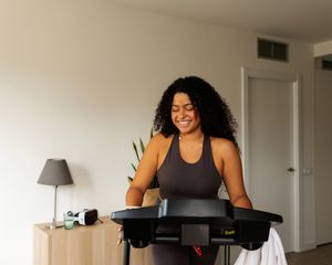 Woman on a treadmill in her home