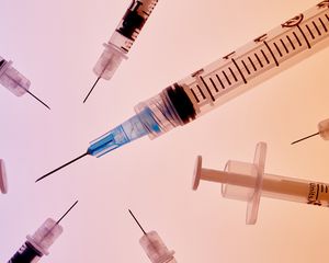 Syringes on an ombre background