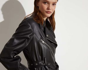 Model wearing vegan leather dress