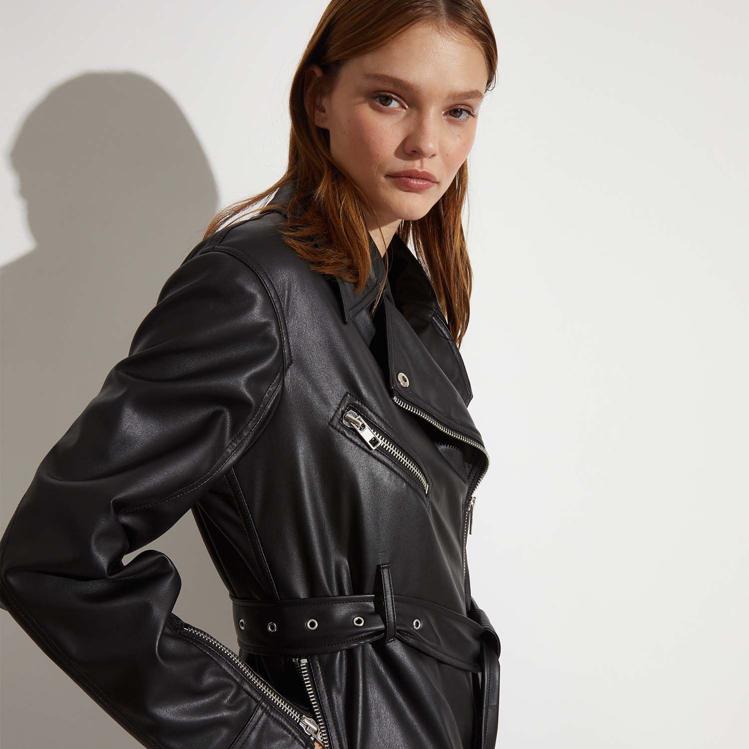 Model wearing vegan leather dress